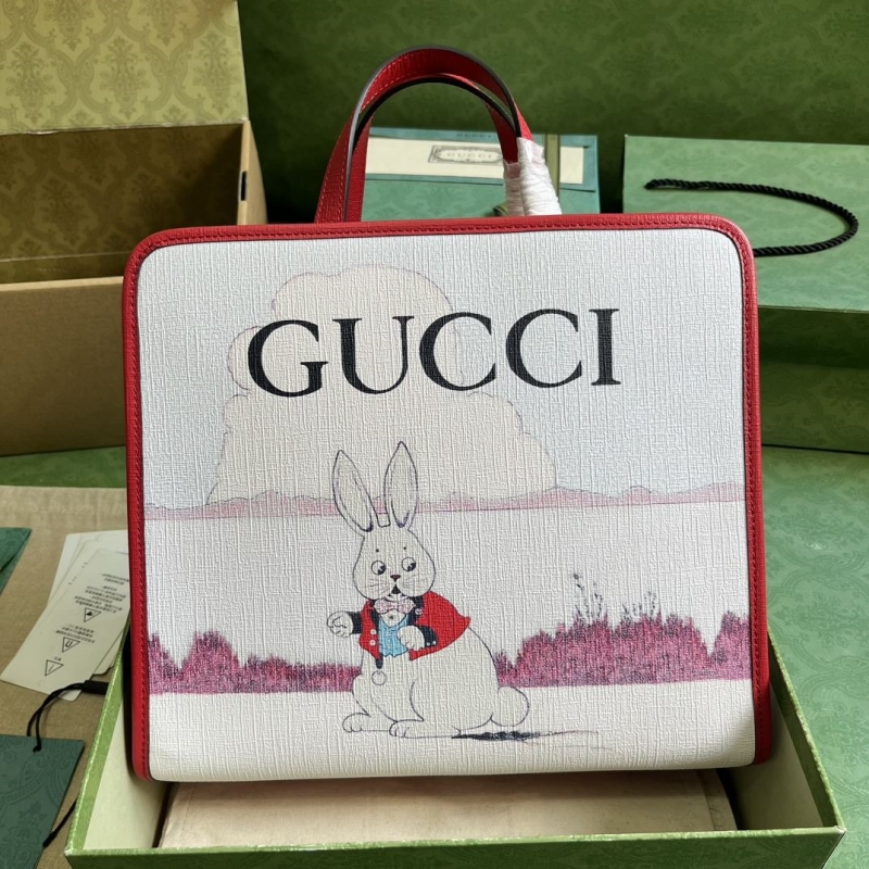 G*u*i shopping bags